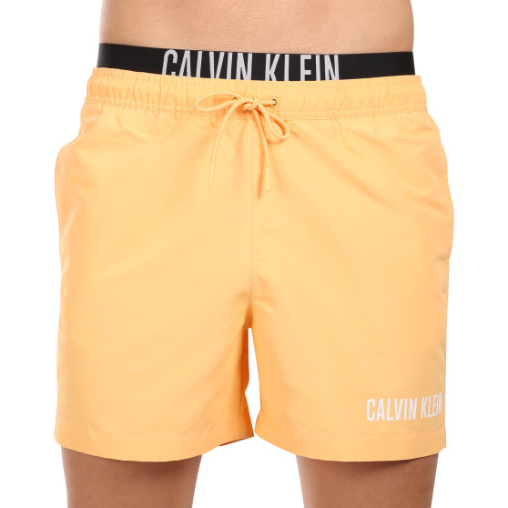 Meeste ujumisriided Calvin Klein oranž (KM0KM00992-SAN)