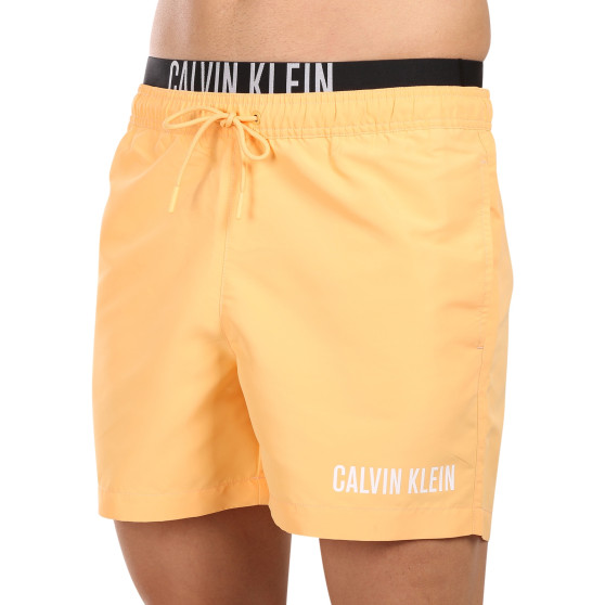 Meeste ujumisriided Calvin Klein oranž (KM0KM00992-SAN)