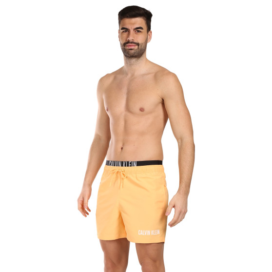 Meeste ujumisriided Calvin Klein oranž (KM0KM00992-SAN)