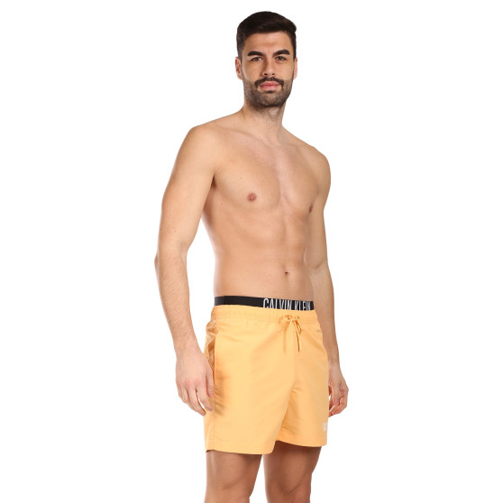 Meeste ujumisriided Calvin Klein oranž (KM0KM00992-SAN)