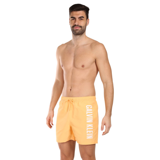 Meeste ujumisriided Calvin Klein oranž (KM0KM01004-SAN)